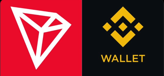 The image shows the TRON logo (a white diamond on a red background) alongside the Binance Wallet logo (a yellow symbol with the word "WALLET" below it) on a black background, representing the integration announced in the post where Binance Wallet has officially added JustLend DAO to its DeFi section for easy TRON ecosystem access.