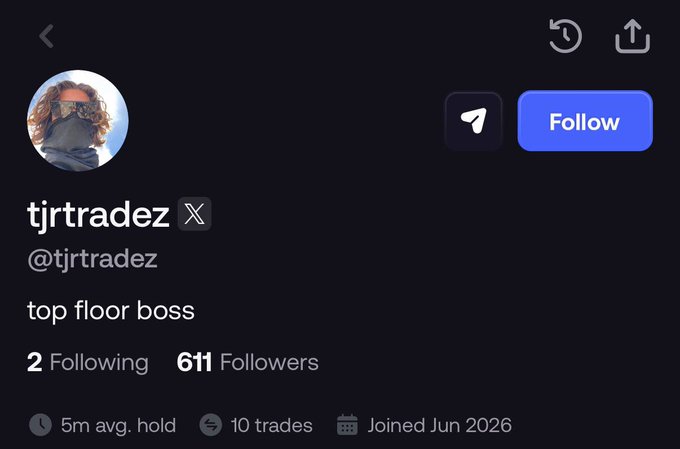 A social media profile page for "tjrtradez" (@tjrtradez), self-described as "top floor boss" with 611 followers, 2 following, a 5m average hold, 10 trades, and joined Jun 2026. The profile links to the post's mention of "@_TJRTrades," confirming the account being referenced.