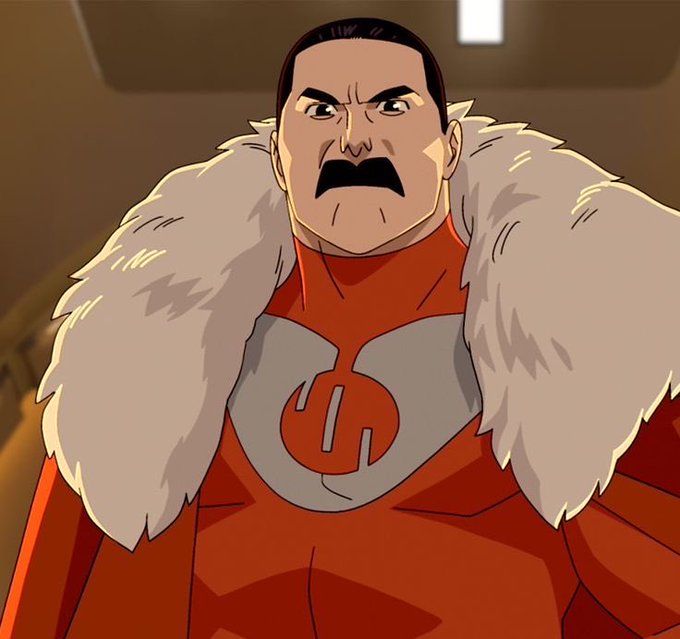 The image features an animated character wearing a red suit with a fur collar and mustache. The character has a serious expression on his face as he looks directly at the camera. The caption below the image reads, "It is presumed that communities form only once the product gains popularity @FIH_USD1 appears to be placing its bets on a different outcome". This suggests that the character might be contemplating or analyzing the situation in front of him and making decisions based on his observations.