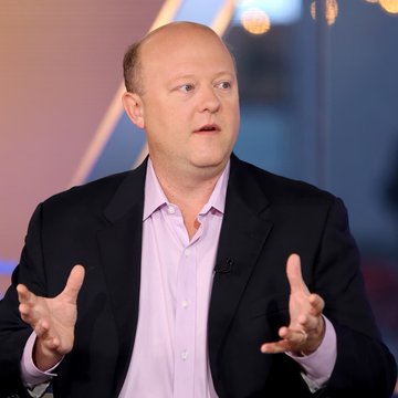Circle CEO Jeremy Allaire speaks with expressive hand gestures during an interview, appearing to make a point about the shifting payments landscape. His animated demeanor reflects the confident message that stablecoins and innovators are taking the lead away from traditional banks.