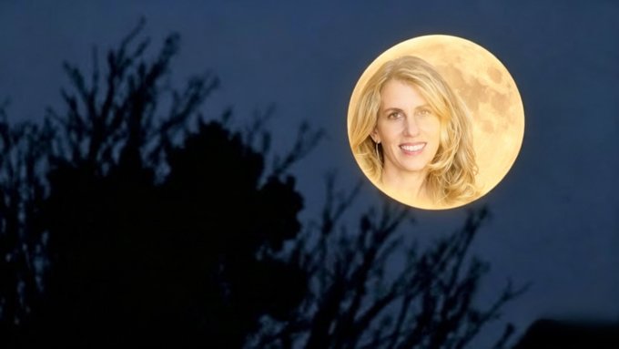 A large full moon in a twilight sky with tree silhouettes in the foreground, featuring a superimposed photo of a blonde woman's face on the moon.