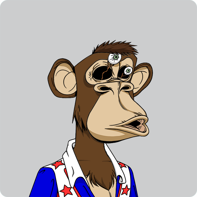 A cartoon illustration of a confused-looking brown monkey with three mismatched eyes, wearing a blue shirt with red stars and a white collar, on a gray background.