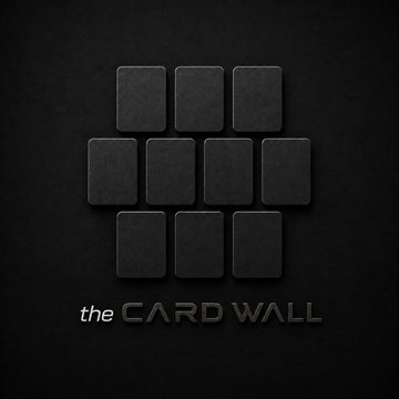 A minimalist graphic design on a black background displaying a 3x3 grid of textured black squares above the metallic text 'the CARD WALL'.