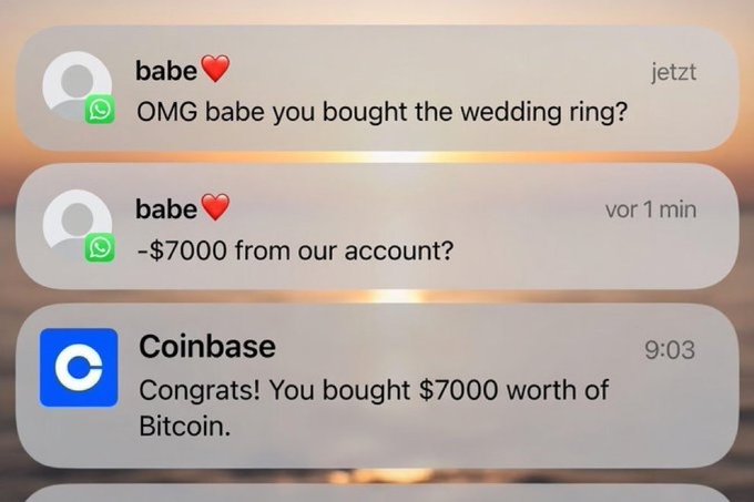 A man tells his partner he was thinking about a wedding ring, but a Coinbase notification reveals he spent $7000 on Bitcoin, causing his shocked girlfriend to ask "OMG babe you bought the wedding ring?" before realizing "−$7000 from our account?"