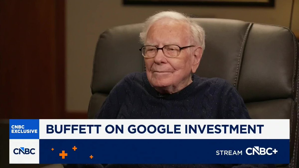 Warren Buffett sits in a leather chair during a CNBC exclusive interview, with the on-screen graphic reading "BUFFETT ON GOOGLE INVESTMENT" as he reveals he spearheaded Berkshire Hathaway's Alphabet (GOOGL) purchase, calling his earlier avoidance of Google one of his biggest investing mistakes.