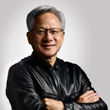 Professional headshot of Jensen Huang, the CEO of NVIDIA, wearing glasses and a black leather jacket, smiling with his arms crossed against a plain white background.