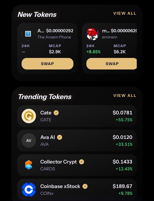 A cryptocurrency app screenshot displaying "New Tokens" (The Ansem Phone and eminem) and "Trending Tokens" (Cate, Ava AI, Collector Crypt, Coinbase xStock) with their respective prices and 24-hour percentage changes.