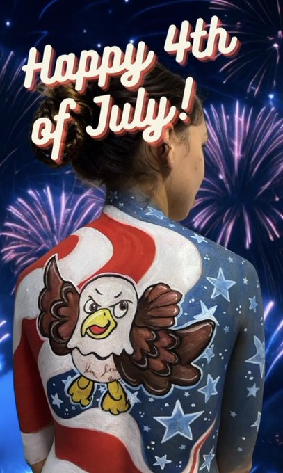 A person's back covered in patriotic body paint featuring the American flag and an eagle design, with 'Happy 4th of July!' text overlaid and fireworks in the background.