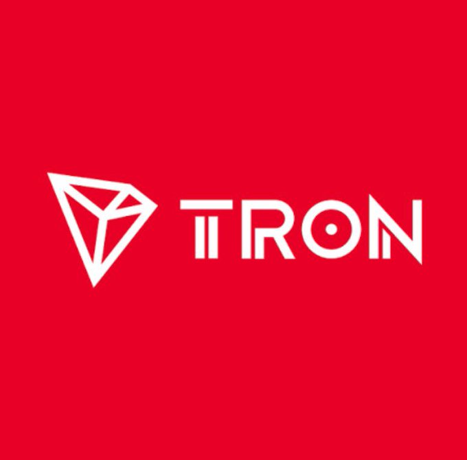 The white TRON blockchain logo and wordmark on a red background.