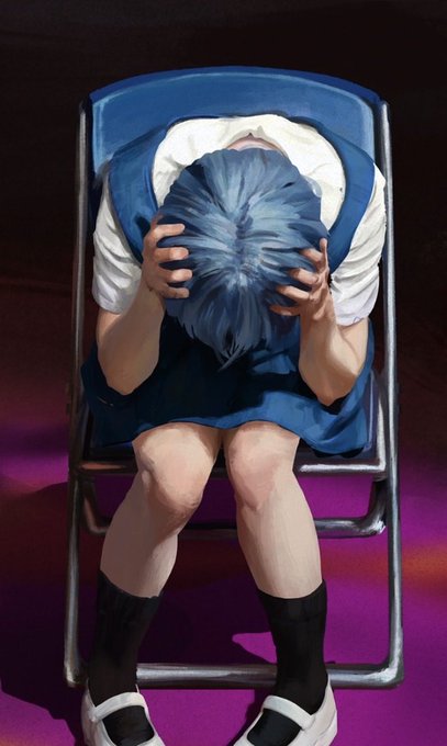 An anime-style illustration of a character with blue hair sitting hunched over in a chair with their head in their hands, wearing a white shirt, blue overalls, and black shoes.