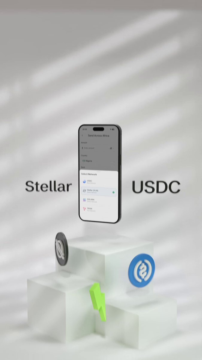 The image features a smartphone with an app called "Stellar" displayed, along with a small green coin and a lightning bolt icon. The text on the image reads "We're live on Stellar Mainnet. SurgePay now gives you: → Wallets → US Accounts → Cross-chain swaps All-in-one money that just works." This suggests that the app is related to cryptocurrency, specifically focusing on wallets and USDC (United States Dollar Coin). The coin icon indicates that the app supports Bitcoin or other cryptocurrencies, while the lightning bolt symbolizes a lightning rod for transactions.