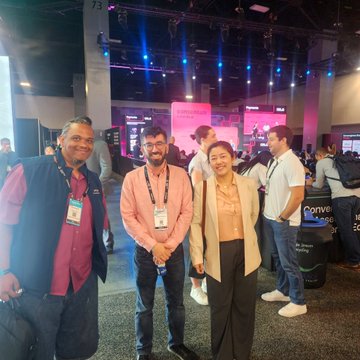 Three people pose together at what appears to be a tech conference, with a "Converge" banner visible in the background, capturing a moment of community engagement ahead of an upcoming Pi Network event. The image reflects the post's theme of anticipation and direct interaction with the Pi Core Team, likely taken at the venue where such questions could be posed.