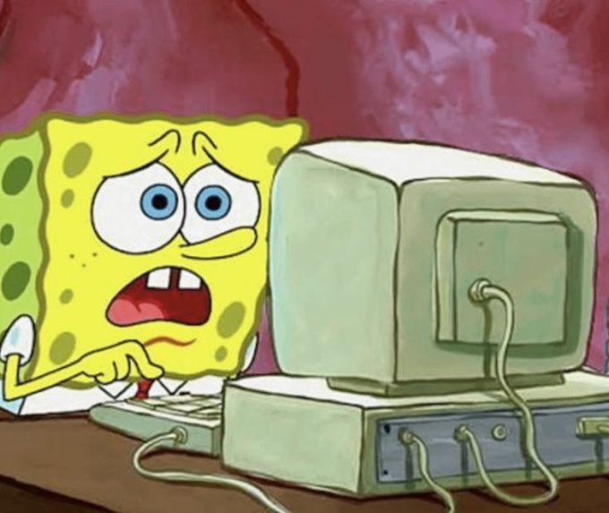 SpongeBob SquarePants looks shocked and worried while staring at an old CRT computer monitor, his mouth open in a panicked expression.