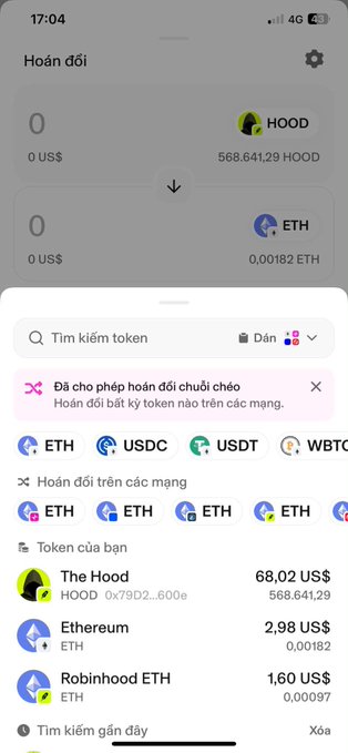 A screenshot of a crypto exchange swap interface showing a balance of 568,641.29 HOOD (valued at $68.02) and 0.00182 ETH, with the HOOD contract address 0x79D2...600e matching the one referenced in the post about the Robinhood meme coin ($HOOD).