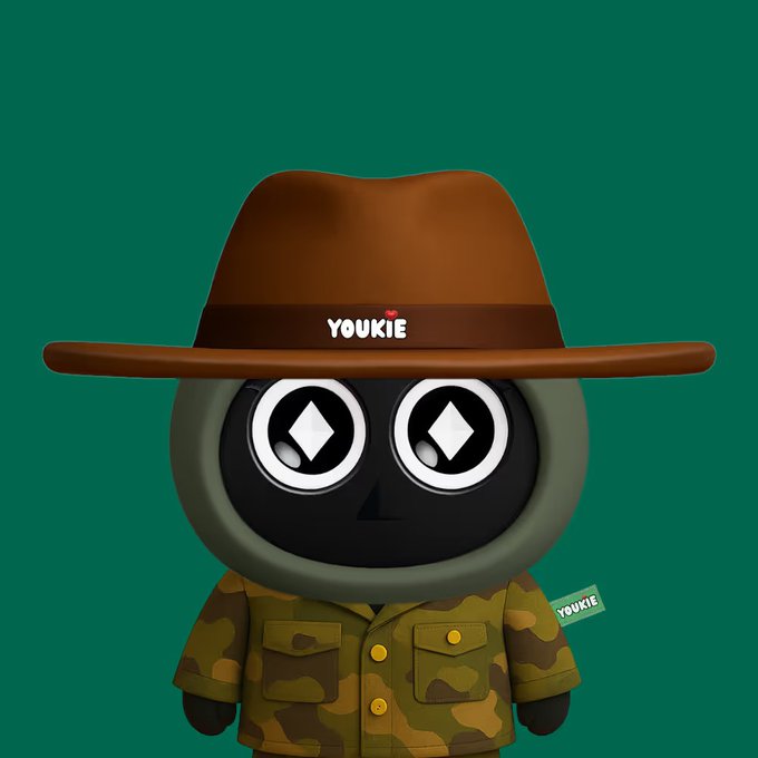 The image features a cartoon character dressed as a mannequin wearing a hat that says "Yokie". This quirky attire suggests that the person might be related to the popular Youkie meme or brand associated with the character's attire. The background of the image is green, which gives it a festive vibe and could potentially be related to the recent release of Ethereum breaking $8,000 within months, as suggested by the post caption. Additionally, there are two mentions of blockchain in the image, hinting at its connection to the world of digital transactions and tokenized assets. Overall, this image portrays a light-hearted and fun atmosphere centered around the concept of Youkie and the blockchain market.