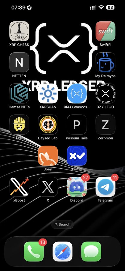 An iPhone home screen featuring an 'XRP LEDGER' themed wallpaper and various XRP-related apps including XRP Chess, SwiftFi, Hamsa NFTS, XRPSCAN, XRPLCommons, Possum Tails, Zerpmon, Joey, Xaman, xBoost, Discord, and Telegram.