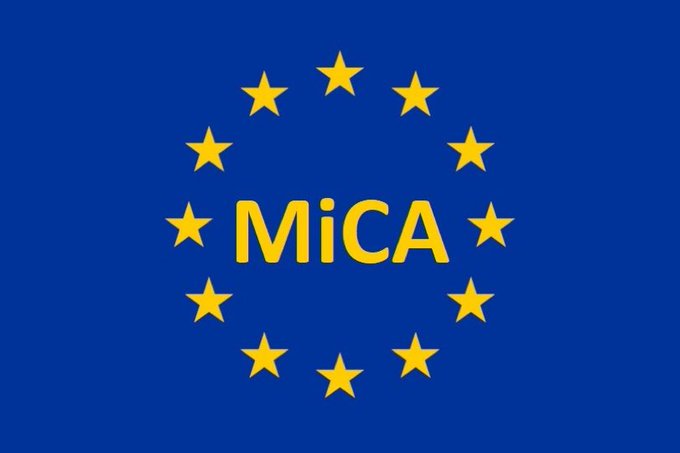 The image displays a blue flag with a circle of 12 yellow stars, similar to the EU flag, but with "MiCA" written in bold yellow letters across the center, referencing the European Union's Markets in Crypto-Assets regulation. This visually ties to the post's discussion of the new MiCA licensing requirements that took effect July 1st, restricting unlicensed crypto exchanges from operating across Europe.