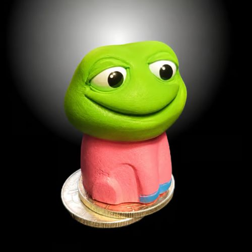 A green frog-like figurine with a sly smile sits atop stacked coins, including what appears to be a copper-colored coin, against a dark background. The image, associated with the post containing the ticker "$TFD" and a Solana contract address, visually represents a meme coin figurine perched on cryptocurrency money.