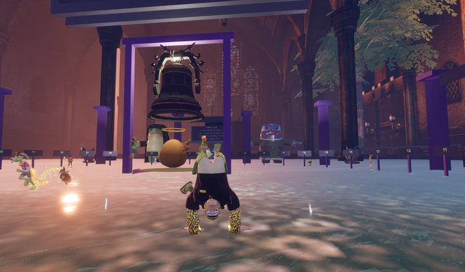 A virtual environment depicts an avatar standing in a large hall with stone pillars, beneath a massive floating bell, with various user avatars scattered around.