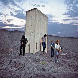 The image shows the iconic "Who's Next" album cover featuring The Who, with the band standing around a stone monument in a desolate landscape. This relates to the post about $NBIS issuing 4.5 billion in converts, as the "Who's Next" theme humorously suggests anticipation of who will be the next company to flood the market with endless convertible debt issuance.