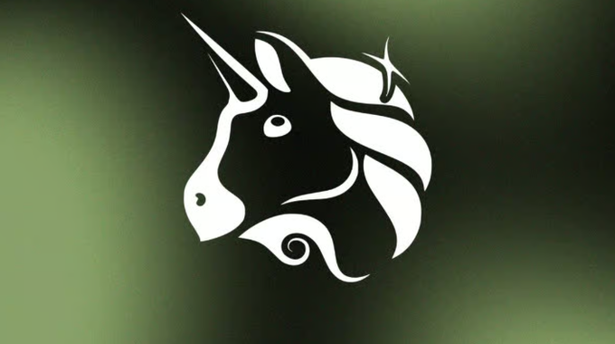 A white stylized unicorn logo on a blurred green background.