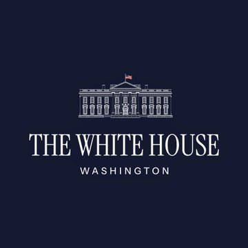 The image displays a dark navy blue graphic featuring a stylized white illustration of the White House building, with an American flag on top, accompanied by the text "THE WHITE HOUSE" and "WASHINGTON" beneath it. This official White House branding accompanies a breaking announcement that the administration is actively pursuing the creation of a strategic Bitcoin reserve for the United States.