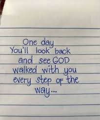 A handwritten note in blue ink on lined paper reads, "One day You'll look back and see GOD walked with you every step of the way..." offering a comforting, faith-based reminder that aligns with the post's message of encouragement for someone needing reassurance.