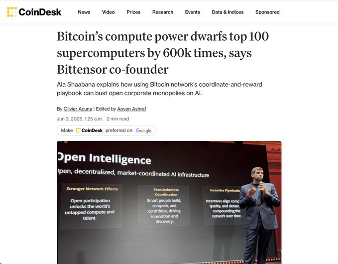 The image shows a man standing behind a podium at an event, with a large screen displaying information about Bitcoin's power computing capabilities. The text in the image suggests that the Bitcoin network has the potential to outperform top-100 supercomputers by 600,000 times, and it is powered by an open intelligence architecture. This information is likely related to a post on CoinDesk, which is described as a "focus on what is in the image and how it relates to the post".