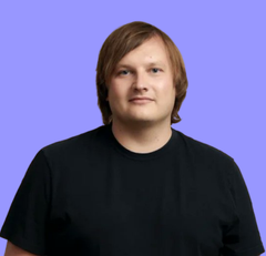 The image shows a man with light brown hair wearing a black t-shirt against a purple background. He appears to be Stani Kulechov, the founder of Aave, who is pictured here in connection with his comments about Avalanche's potential in onchain finance and tokenization.