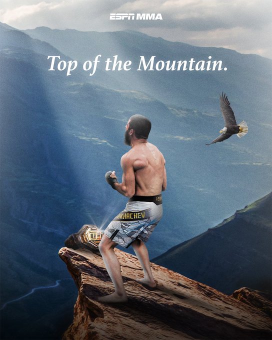 An ESPN MMA promotional image titled 'Top of the Mountain' showing a shirtless fighter in 'MAKHACHEV' branded shorts standing on a cliff edge with a championship belt and a flying eagle.