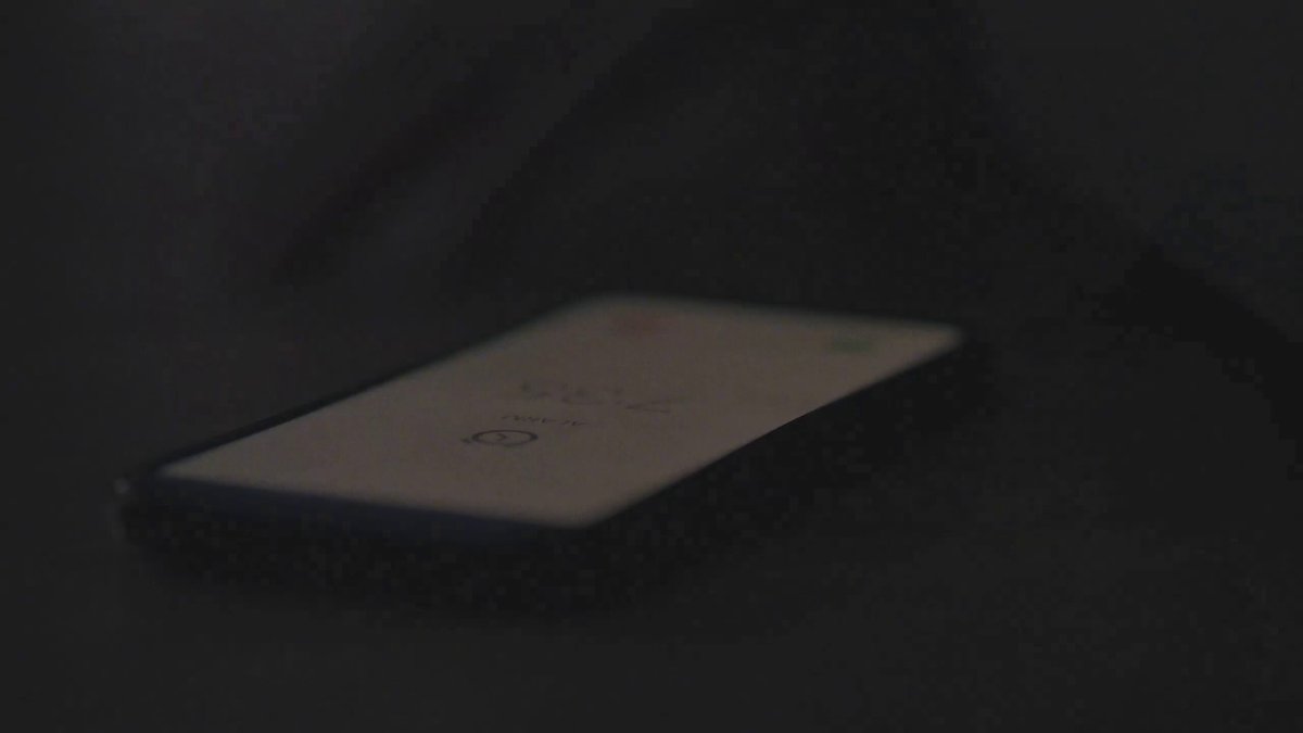 The image shows a cell phone placed on a table or desk with its screen facing upwards. The background appears to be black, which makes the cell phone stand out prominently. The text above the image reads "Stablecoins already proven they can move value at scale. @trondao The next challenge is making them invisible to the user." This suggests that stablecoins are being used as a means of payment or exchange in an increasingly digital world. The focus on this aspect highlights the importance of stablecoins and their potential impact on the future of currency and financial systems.