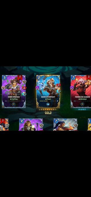 The image features a collection of six different cards displayed against a black background, each showcasing unique characters or abilities. The cards are arranged in two rows with three cards in each row. The first card in the top row has a brown character on it, while the second card is blue and red. In the middle row, there's another brown character, this time accompanied by a purple character. The third row features a black character, followed by a gold character at the bottom of the image. The text "What a freaking weekend @splinterlands players! I pulled a GFA Rare from CA.. but I’ve also pulled FOUR Gold Foil Legendaries in the last 24 hours, two being on stream and two off stream!" is written above each card to provide context about the cards displayed.