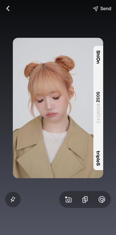 A mobile app screenshot showing a photo of a young woman with blonde space buns and bangs looking down, with the names 'Shion' and 'tropies' visible on the side along with text '#tropies_54' and '5032'.