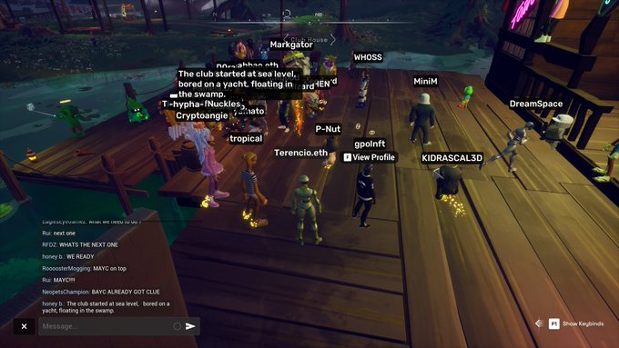 A screenshot from a virtual world game showing multiple avatars on a wooden dock with username tags like 'Markgator', 'WHOSS', and 'DreamSpace' floating above them, with chat discussing a yacht, swamp, and sea level.