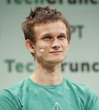 A young man with tousled brown hair, wearing a teal t-shirt and a small headset microphone, appears on stage in front of a "TechCrunch" backdrop.

This image is widely associated with Vitalik Buterin, the co-founder of Ethereum, connecting to the post about his announcement of Ethereum's major new roadmap—covering the Lean Ethereum upgrade, built-in privacy features, and quantum-safe security by 2029—even as ETH's price has dropped 64% from its 2025 high.