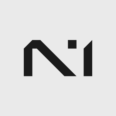 A minimalist black logo on a white background resembling stylized letters 'N' and 'i' or 'A' and 'i'.
