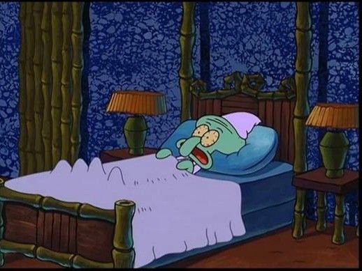 Squidward from the animated series SpongeBob SquarePants lies in a four-poster bed, appearing startled with his mouth open.