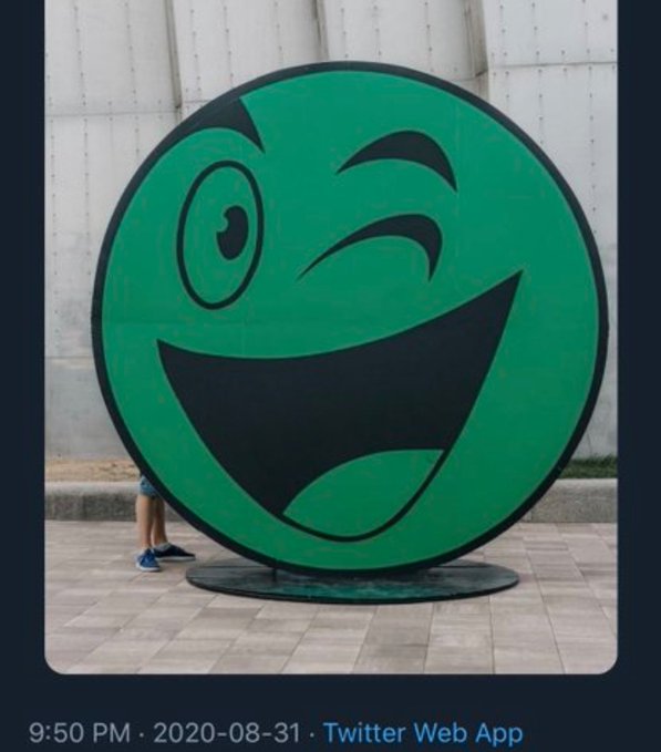 A large green smiley face sign (resembling the XRP/crypto community logo) stands outdoors on a tiled walkway, with a person visible behind it. The tweet timestamp shows 9:50 PM · 2020-08-31 · Twitter Web App, posted by "Mr Pool" referencing $XRP, matching the cheerful green emoji-style imagery.