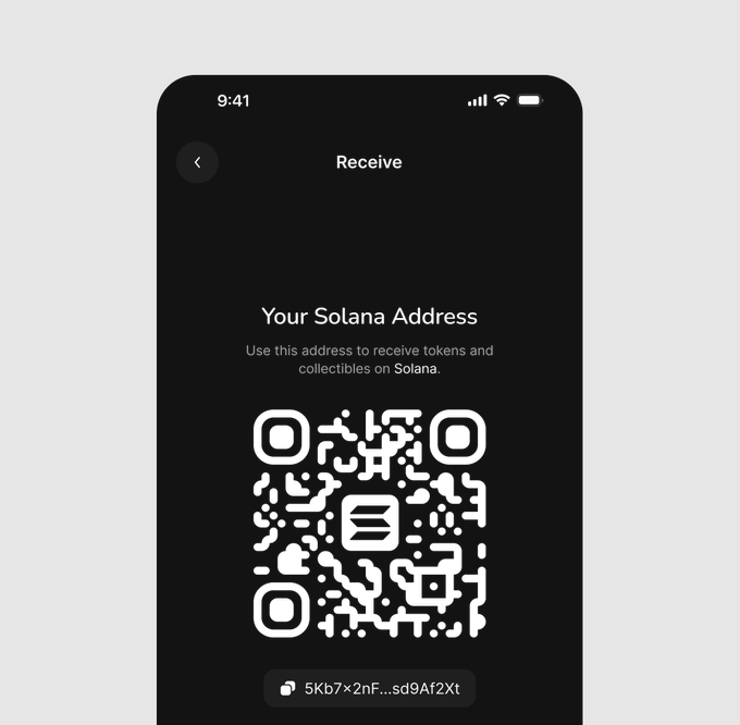 A mobile wallet interface displaying a "Receive" screen with a Solana QR code and the partial address "5Kb7×2nF...sd9AfzXt" for depositing tokens and collectibles on the Solana network. The screen exemplifies a chain-specific deposit feature by providing a dedicated Solana address for receiving assets on that blockchain.