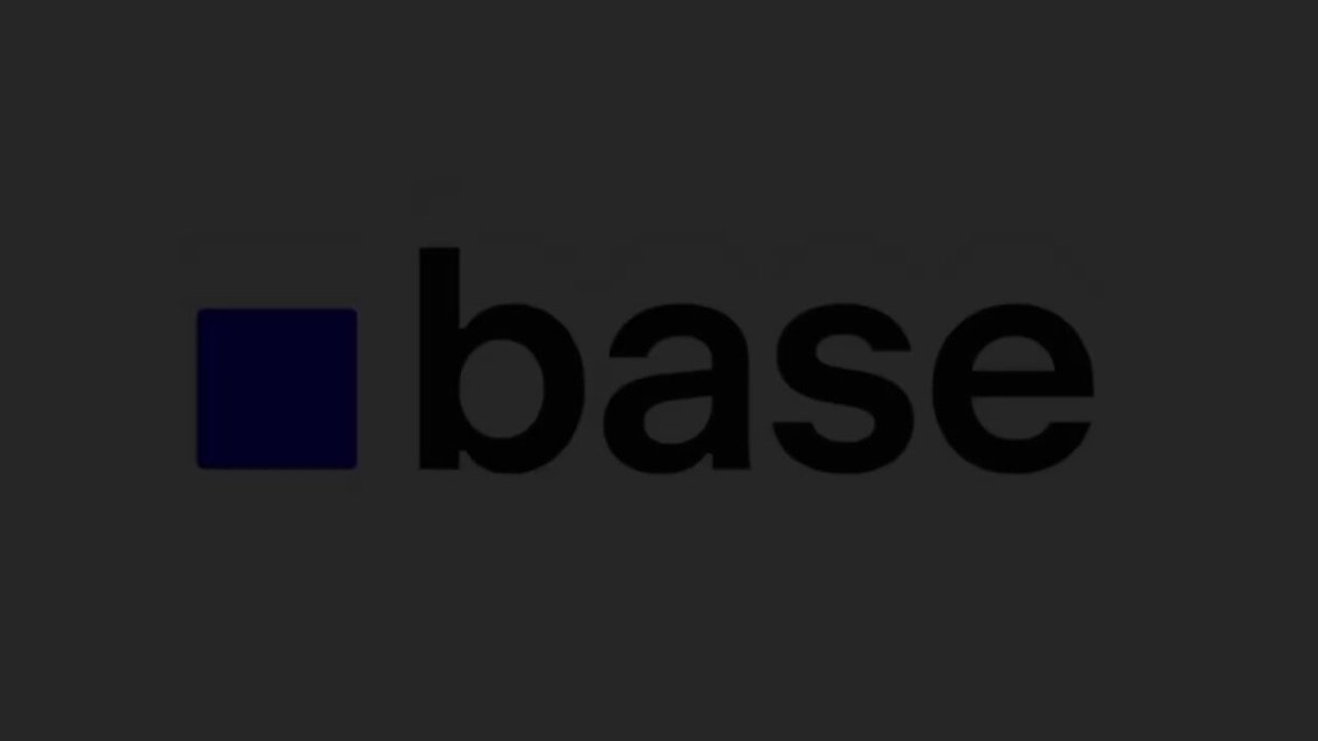 The image features a gray square with the word "Base" written in black letters, positioned centrally within the frame. The background of the image is a solid color, which contrasts nicely with the white text. The overall composition of the image suggests that it could be related to an animal charity wallet post or a social media post promoting a charitable cause.