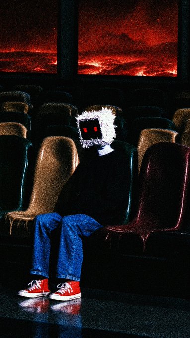 A retro-style, grainy digital artwork depicting a shadowy figure wearing a TV-headed mask with glowing red eyes, sitting alone in a dark movie theater illuminated by a fiery red window.