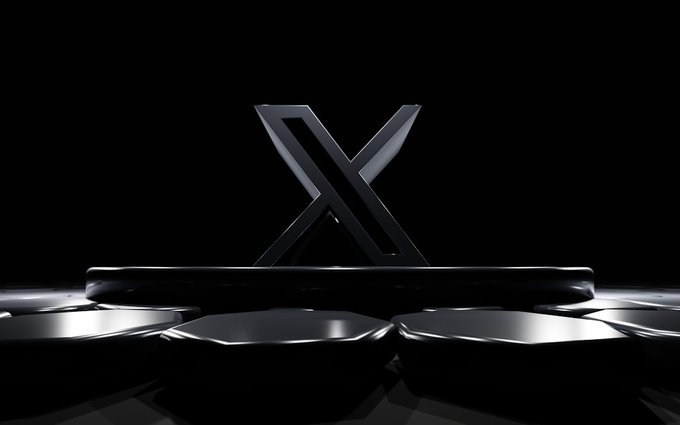 A sleek 3D render showing a black stylized 'X' logo on a pedestal, surrounded by circular metallic discs against a dark background.