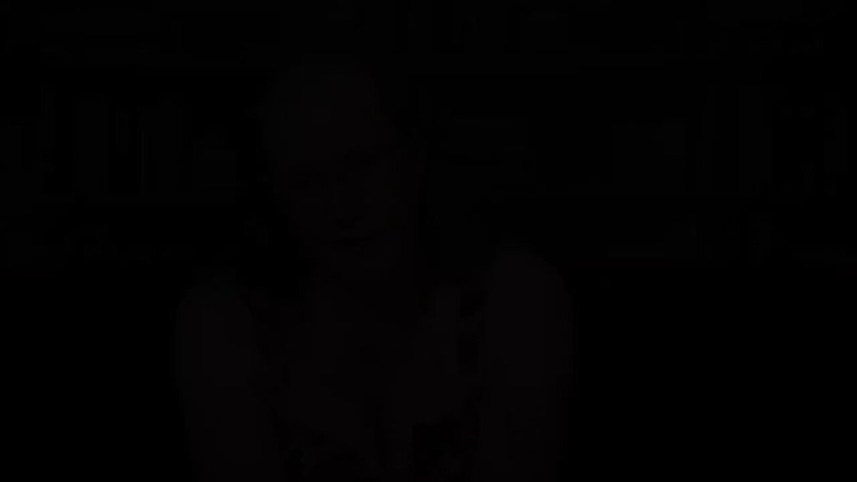 The image shows a woman with dark hair wearing glasses, sitting against a black background. The photo has been edited to appear as if she is looking directly at the camera, creating an interesting visual effect. The caption below the image reads "REWIND: ZCASH POSTED THIS ON PRIVACY" and includes some text that may be related to privacy or personal information.