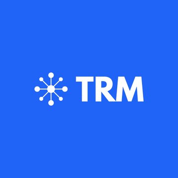 The image shows the TRM Labs logo—a stylized white network/hub icon next to the letters "TRM"—on a blue background, which corresponds to the company's brand identity referenced in the news about its $2 billion valuation Series C expansion led by Blockchain Capital.