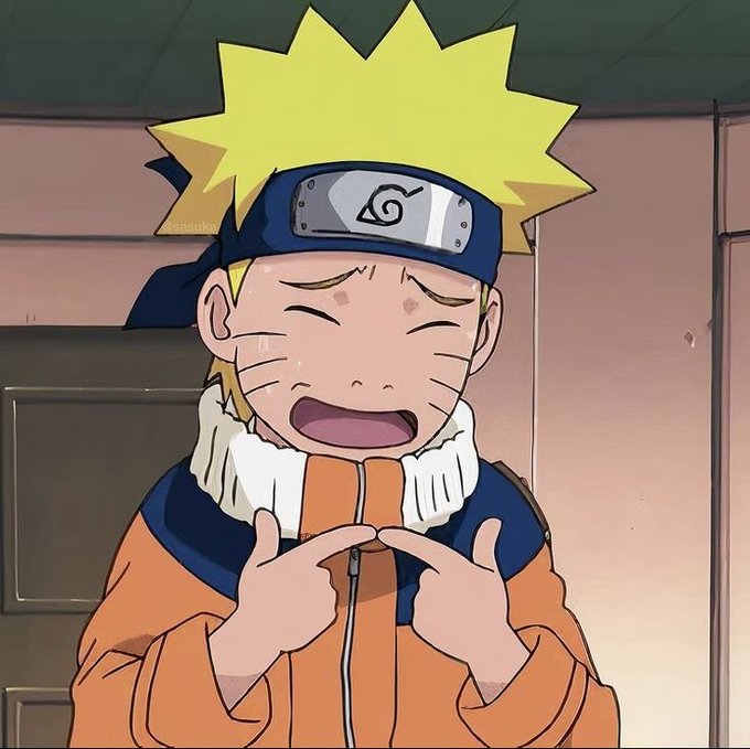 An anime screenshot featuring the character Naruto Uzumaki, a young boy with spiky yellow hair and a blue headband, smiling and pointing at his orange and blue jacket.
