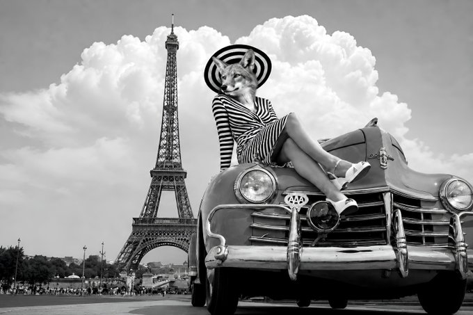 A black and white photograph showing a woman in a striped outfit and wide-brimmed hat posing on the hood of a classic vintage car with the Eiffel Tower in the background.