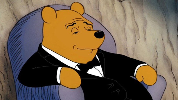 Winnie the Pooh is depicted wearing a black tuxedo while lounging in a chair, humorously juxtaposing a sophisticated look with the user's observation of high demand for SOL despite falling prices.