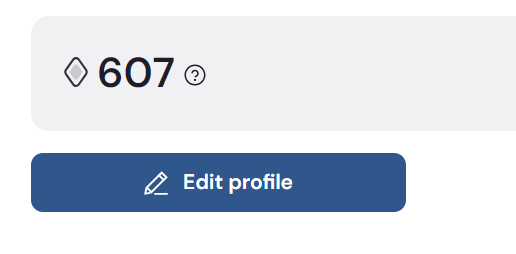A profile interface displaying a diamond icon next to '607' with a help icon, and a blue 'Edit profile' button below it.
