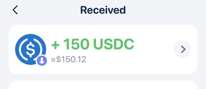 A mobile wallet confirmation screen showing a received transaction of +150 USDC (≈$150.12) with a USDC logo and download icon.