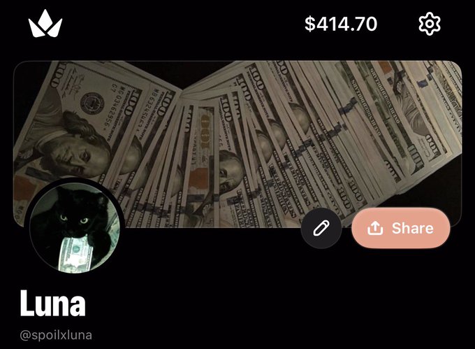 A dark-themed app or webpage displaying a balance of '$414.70', a profile named 'Luna' with the handle '@spoixluna', an image of fanned hundred-dollar bills as the cover photo, and a profile picture of a black cat.